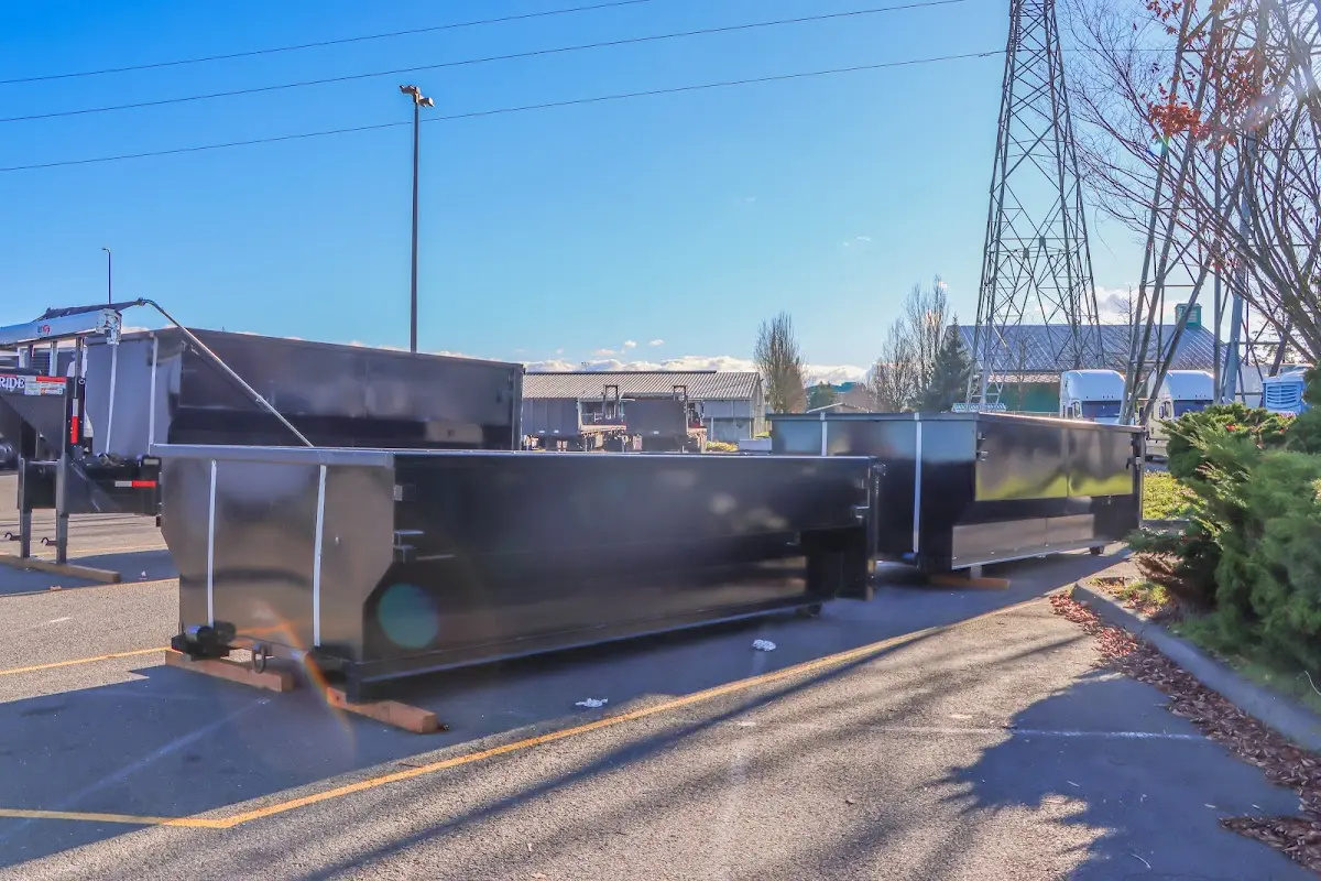 Roll-off dumpster ready for waste disposal at job site for Demolition Dumpster Rental in Perth Amboy